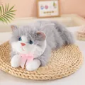 Detailed macro view of a grey and white Ragdoll cat plush toy with a cute pink bow - Gray (With Sound) / 45cm (Small)