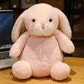 Adorable pink floppy ear rabbit plush toy made of soft material in a sitting pose - 25cm / Pink Rabbit