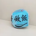 Macrodetail van de blauwe pluche beslissingsdobbelsteen met de tekst 'Koken' en een lepel - Huishoudstijl / 10cm / Blauw