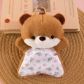Close-up detail of a cute brown plush bear bean bag toy with floral pattern body - Bear / Beanbag Otter