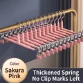 Non-slip Sakura Pink pants hanger with adjustable clips for efficient closet organizing - Adjustable Clip Non-marking Hanger / Sakura Pink
