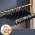 Non-slip seamless pants hangers in obsidian black finish for wardrobe organization - Seamless Trousers Rack (Adjustable Clips) / Midnight Black