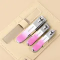 Portable 4-piece manicure set with pink gradient nail clippers in a beige leather case - 4-Piece Manicure Kit