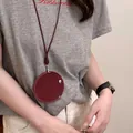 Bolsa de cuello circular de cuero burdeos minimalista para auriculares o llaves - Bolsa Redonda Roja