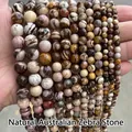 Vue détaillée de perles de pierre zèbre naturelle australienne aux motifs très uniques - 4mm (Env. 90 pcs/brin) / Pierre de Zèbre Australienne Naturelle