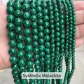 Vue détaillée de rangs de perles de malachite synthétique de tailles variées. - 4mm (Env. 90 pcs/brin) / Malachite Verte Synthétique