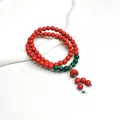 Rotes Zinnober-Doppelschleifen-Armband mit grünen Malachitperlen und Lotusanhänger - Lotus-Anhänger (5665728761862) / Rot