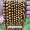 Vue macro détaillée de perles rondes en jaspe à grain de bois jaune naturel diverses - 4mm (Env. 90 pcs/brin) / Jaspe naturel à grain de bois jaune