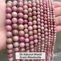 Détail macro de perles en pierre de grain de bois naturel 5A pour bijoux sur mesure - 4mm (Env. 90 pcs/brin) / Pierre à Grain de Bois Rouge Naturelle 5A