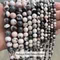Vue détaillée de perles rondes en pierre de zèbre rose naturelle pour bijoux DIY - 4mm (Env. 90 pcs/brin) / Pierre Zèbre Rose Naturelle