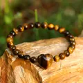 Natur Tigerauge Armband mit Herzperle und goldenem Katzenaugenglanz für Damen - Herz Tigerauge Armband / Gelbes Tigerauge