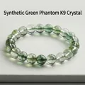 Bracciale in cristallo fantasma verde sintetico con perle tonde verde traslucido - 8mm (Grado K9) / Verde