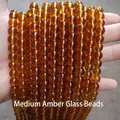 Premium medium amber colored glass beads for DIY jewelry making and beadwork crafts. - 6mm / 60Pcs Set / Medium Amber