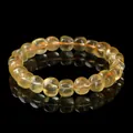 Natuurlijke honinggele boonvormige kralenarmband op reflecterende zwarte achtergrond - Nieuwe Citrien Stijl / 8-9MM / Geel