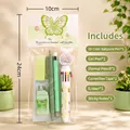 Detail view of butterfly stationery set including pens, eraser and correction tape - 6-Piece Set / Green