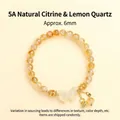 Bracciale in perline di citrino giallo naturale 6mm con elegante ciondolo a fiocco - Citrine & Lemon Quartz Butterfly Design