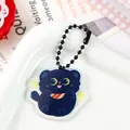 Close-up of cute dark blue cat acrylic keychain with moon eyes and black ball chain - Scarf Kitty (2088)