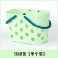 Light green heart-shaped cutout plastic bath storage basket with teal handles - 1 Piece / Light Green
