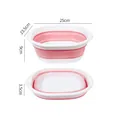 Pink collapsible washbasin variant showing 25cm width and 9cm expanded height dimensions. - S / Pink