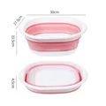 Portable pink collapsible washbasin shown in both expanded and folded dimensions - M / Pink