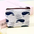 Mini canvas coin purse for students featuring a cute blue whale pattern print design - Fish