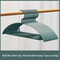 Set of deep blue non-slip seamless plastic clothes hangers with anti-shoulder bump design - Dark Blue