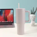 40oz stainless steel insulated vacuum tumbler with handle and straw in office desk setup - 40oz / Lotus Pink