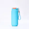 Detail view of light blue soda can shaped insulated bottle with blue rope strap - 500ml / Sky Blue