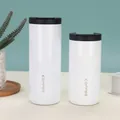 Detailed view of two white stainless steel vacuum coffee mugs in different sizes on a desk - 400ml / White