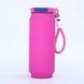 Detail of a pink can-shaped vacuum flask featuring a convenient pink braided carrying strap. - 500ml / Rose Red