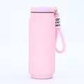 Detailed macro view of a pink can-shaped vacuum flask with a soft braided strap. - 500ml / Pink