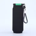 Detailed view of the green lid mechanism and woven strap on a matte black soda can cup - 500ml / Black