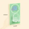 Cartoon wall-mounted toothbrush holder in mint green with cute elephant design - Elephant Pattern / 10.5x5.7cm / Green