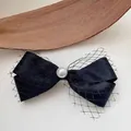 Detailed view of elegant black mesh bow hair clip featuring a central pearl decoration - Grid Mesh Four-Tail Bowknot Spring Clip (5#) / Black