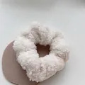 Close-up of a white fuzzy faux fur scrunchie, perfect for warm autumn and winter styles - Lambswool Scrunchie (8#) / White