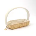 Detail showing straw-woven base and clear PVC top of a portable cosmetic bag - 15x7x14CM / Beige