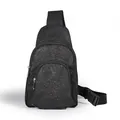 Gedetailleerd overzicht van de fonkelende zwarte glitter crossbody tas met zakken - Zwart