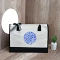 Close-up of a stylish canvas tote bag featuring a blue floral print and striped bow - 43*13.5*30.5cm / Blue and White Porcelain Pattern 1