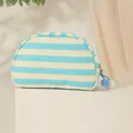 Halfronde canvas make-uptas met blauwe strepen en een schattige pompon-ritstrekker hanger - Ivoor & Marineblauw Gestreept