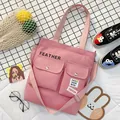 Grand sac fourre-tout en toile rose avec plusieurs poches et bandoulière réglable - Rose
