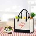 Macro shot of canvas tote bag with red heart print in a kitchen lifestyle setting - LOVE Heart