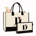 Ensemble de deux sacs en toile crème avec imprimé floral de la lettre D monogramme - Ensemble avec Imprimé Lettre D / Blanc Crème avec Noir