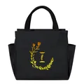 Black insulated lunch tote bag featuring a golden floral letter I pattern print - Gold Gradient Letter I / Black