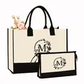 Ensemble élégant sac fourre-tout en toile et trousse maquillage imprimé floral M - Imprimé Lettre M Floral avec Feuilles / Blanc Crème avec Noir