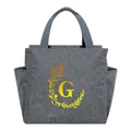 Grey portable insulated lunch bag featuring a floral G monogram and dual side pockets - Gold Gradient Letter G / Gray