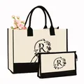 Ensemble de sac fourre-tout et pochette avec monogramme R floral en crème et noir - Imprimé Lettre R / Blanc Crème avec Noir