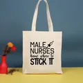 Bolso de lona elegante con estampado gráfico 'Male Nurses Know Where to Stick It' beige - 35*39cm / Nurse-45
