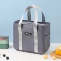 Graue isolierte Lunchtasche mit großem Fassungsvermögen und silbernen Tragegriffen - Grau