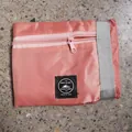 Coral pink foldable travel storage bag with zipper for clothes and luggage packing - Airplane Bag / Flesh Pink