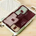 Set of six wine red travel storage pouches and mesh bags for luggage organization - 6-Piece Set / Burgundy
